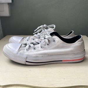 Off white low top Converse with pink/orange details